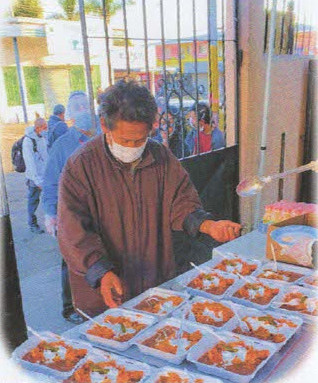 man with food trays